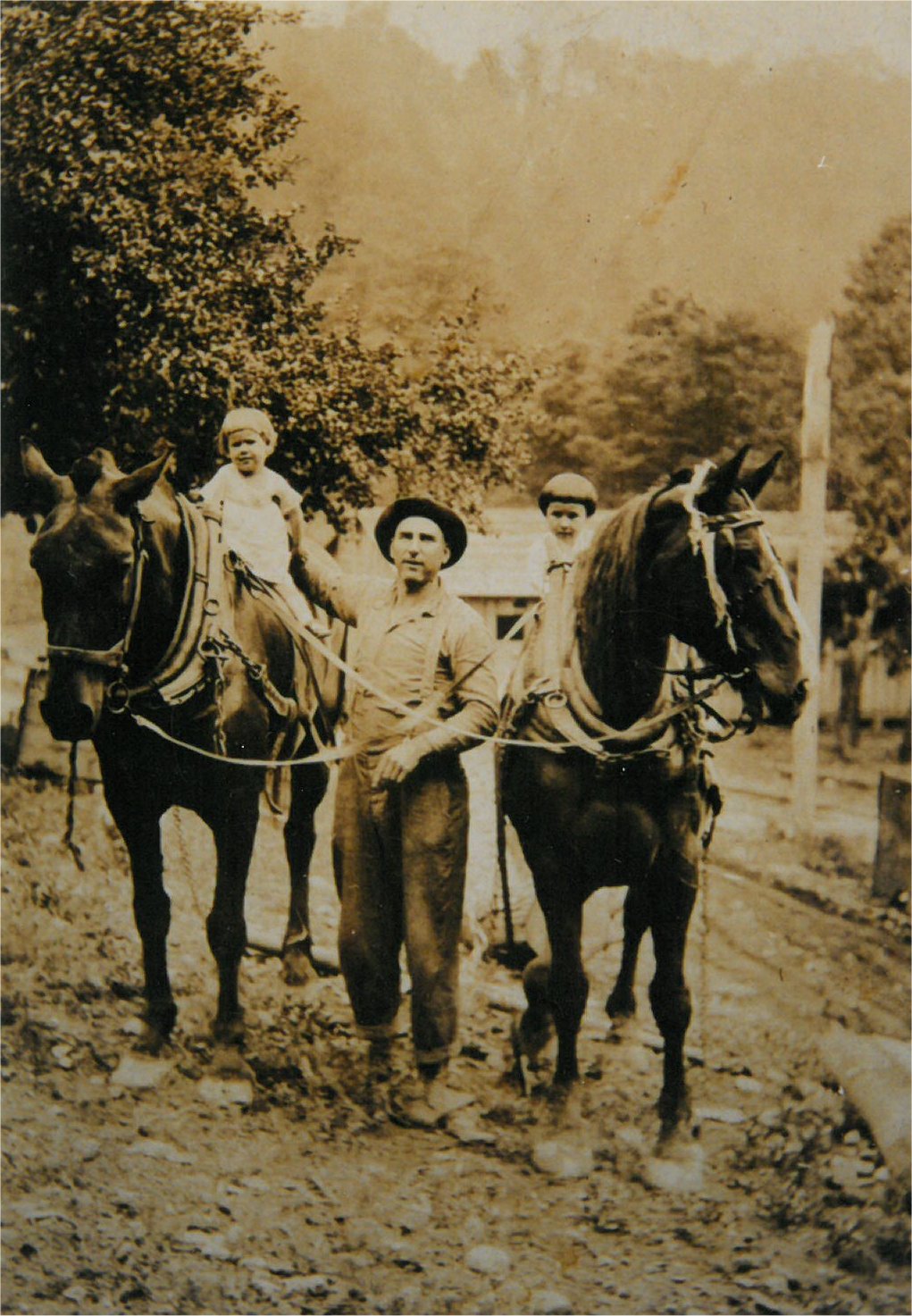 Fred Legg with Daughters.jpg